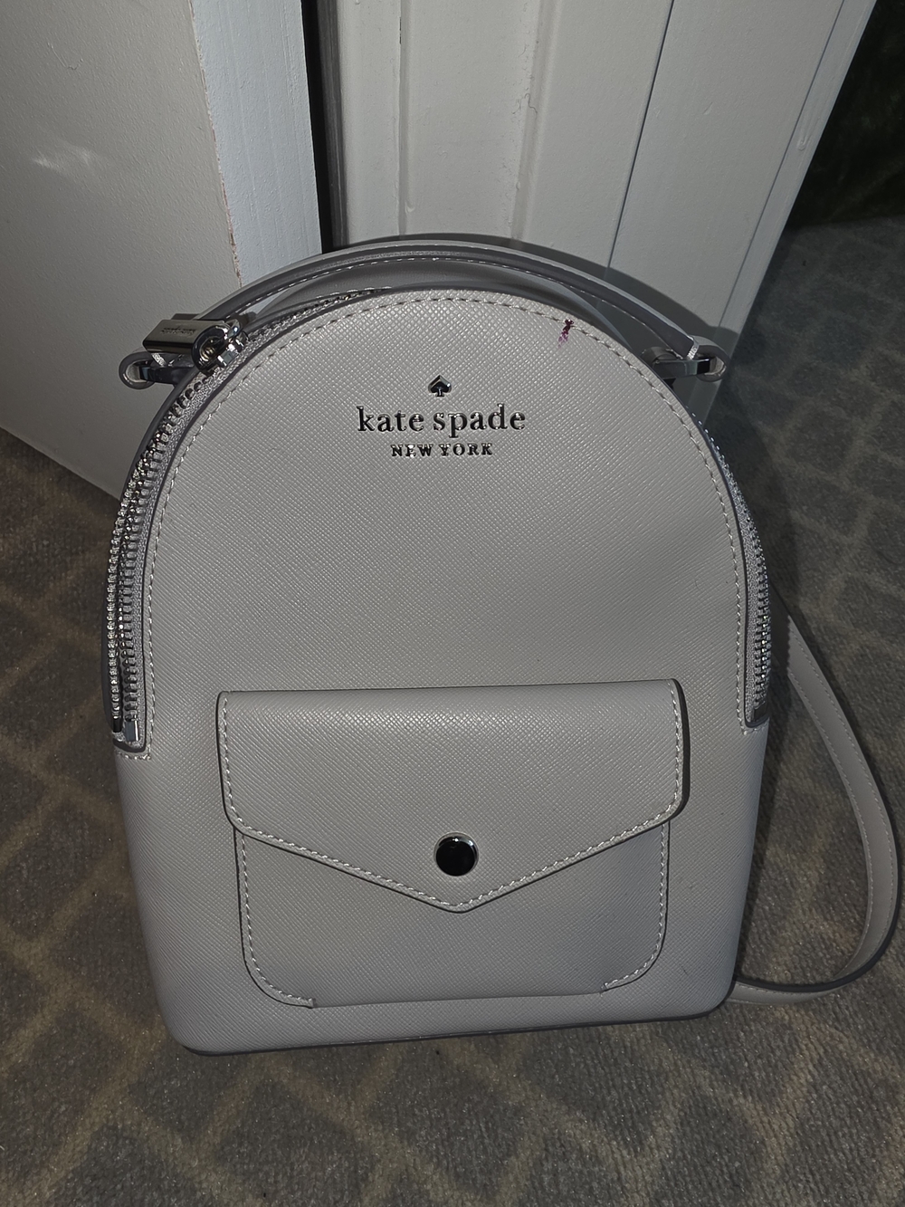 kate spade white mini Saffiano backpack with front pocket